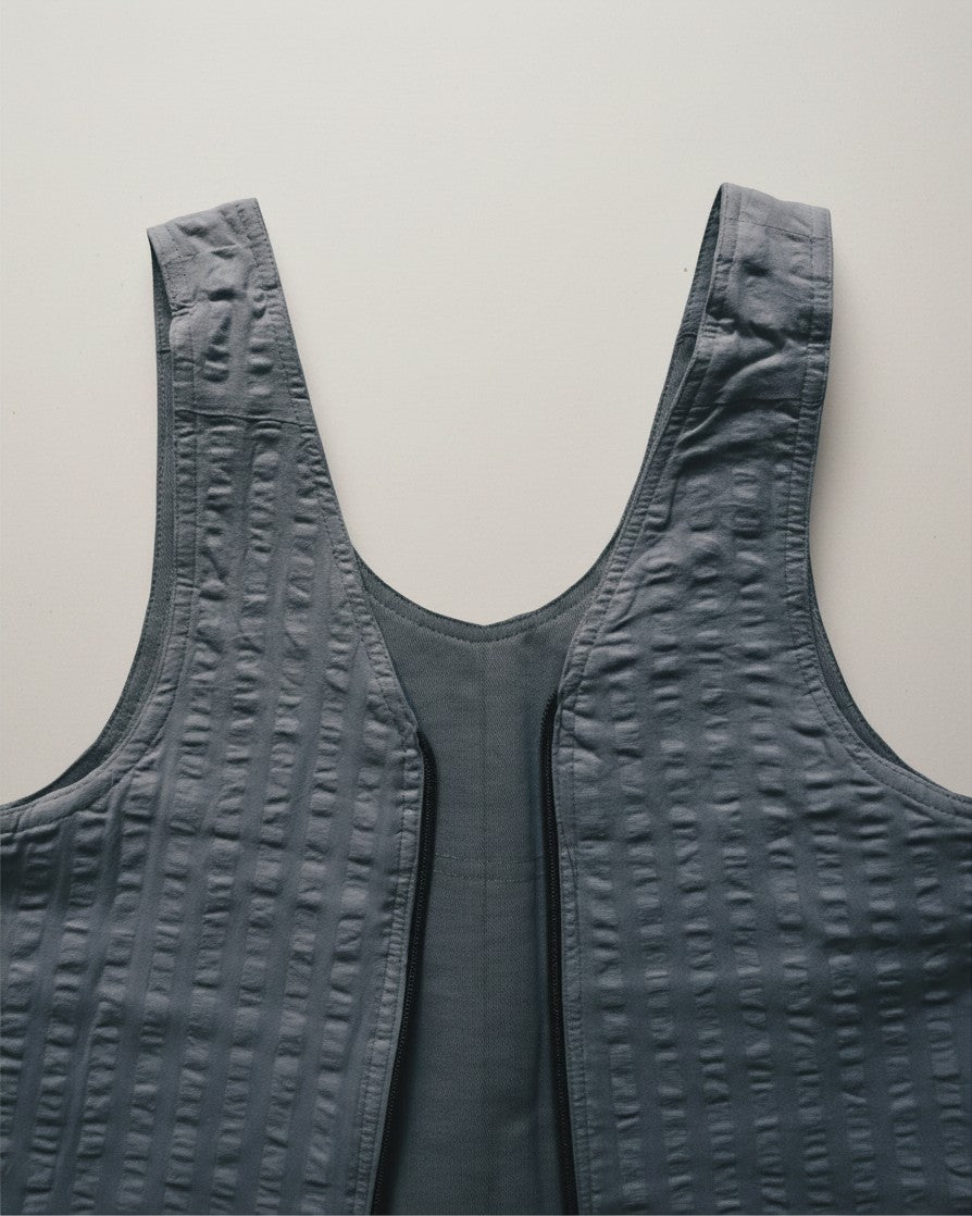 Hue Labs Ash Vest Bag in grey, a reversible handcrafted upcycled garment that converts into a functional bag.