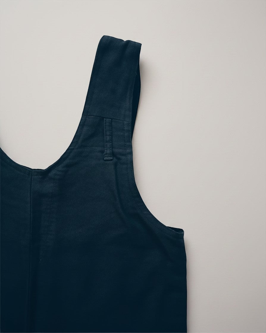 Hue Labs reversible army green vest bag made from upcycled materials with a durable gun metal zipper detail
