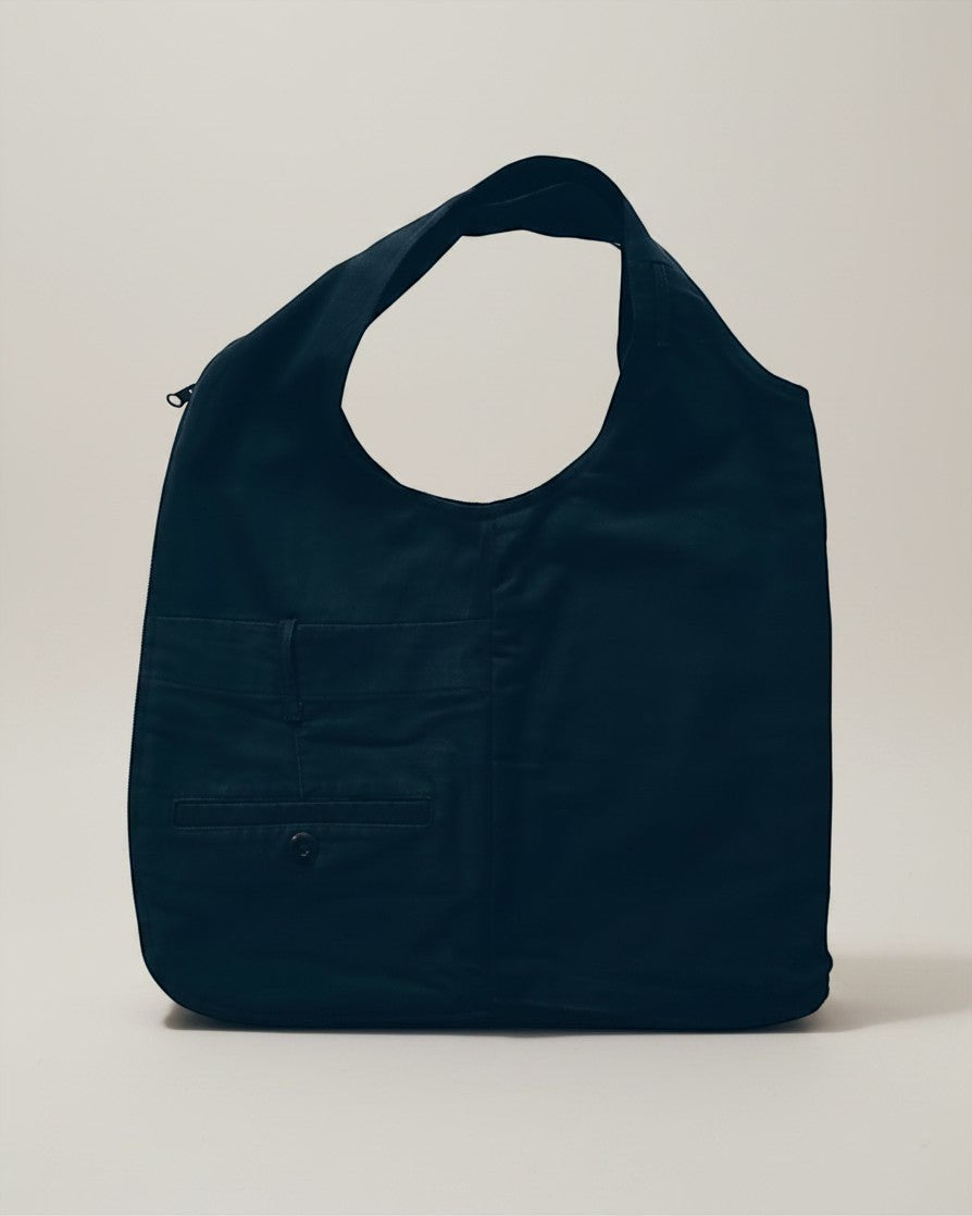 Hue Labs reversible army green upcycled vest bag with gun metal zipper detail