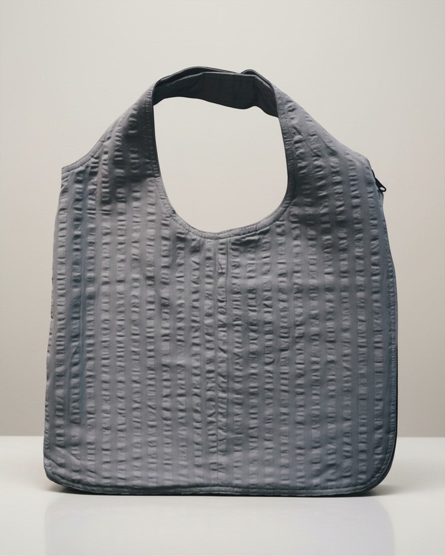 Hue Labs Ash Vest Bag in grey, a reversible handcrafted upcycled accessory that functions as both a bag and a vest.