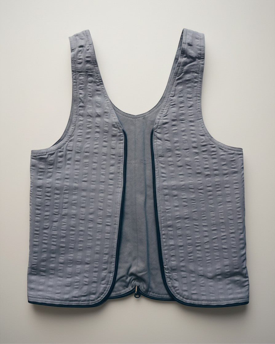 Hue Labs Ash Vest Bag in grey, a reversible upcycled garment that functions as both a vest and a versatile bag.