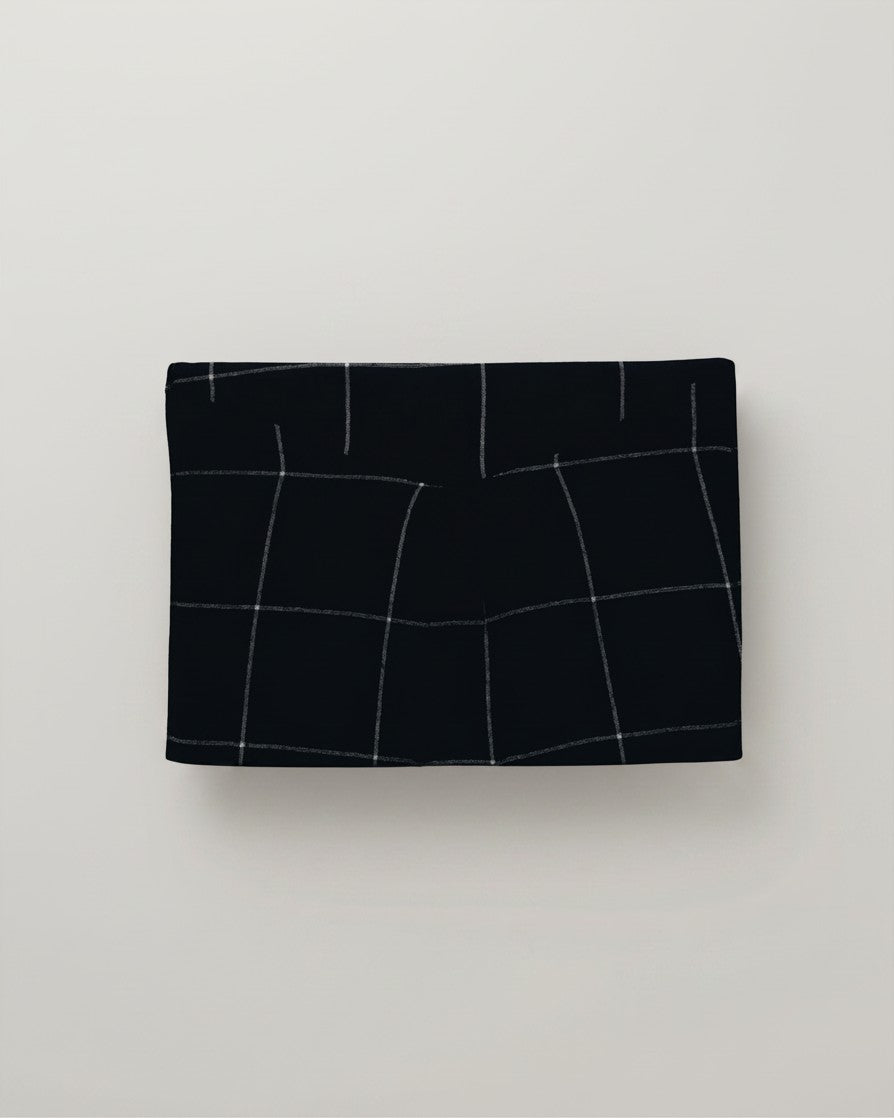 Hue Labs blue checkered envelope clutch made from sustainable upcycled textiles with a magnetic snap closure.