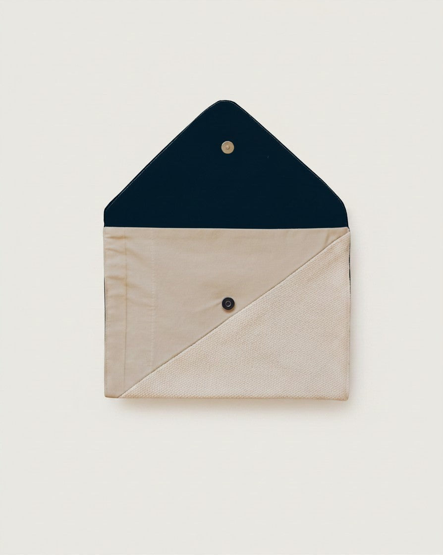 Hue Labs Earth Tones III envelope clutch in beige and navy upcycled textile with a magnetic snap closure