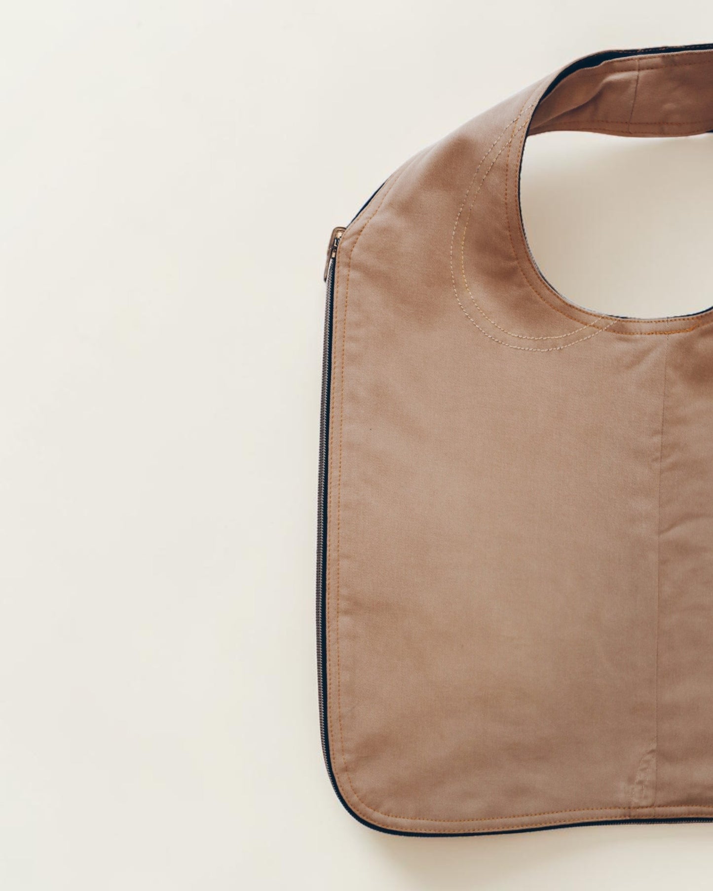 Hue Labs Everyday Essential tan tote bag with a minimalist structured design and ergonomic shoulder strap.
