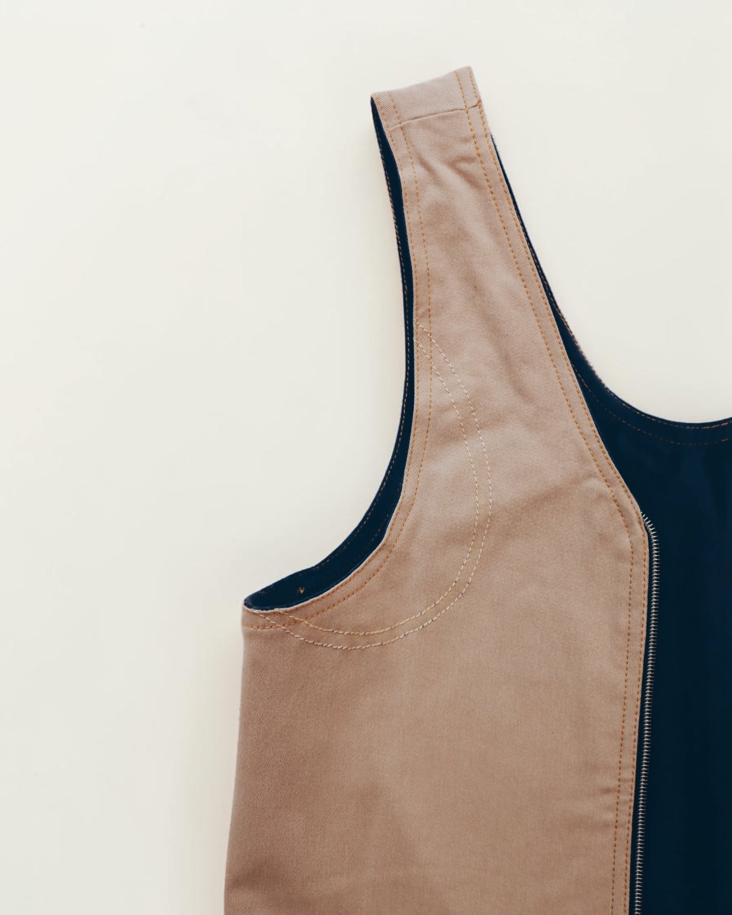 Hue Labs Everyday Essential tote bag in tan and navy blue with durable canvas construction and ergonomic shoulder strap