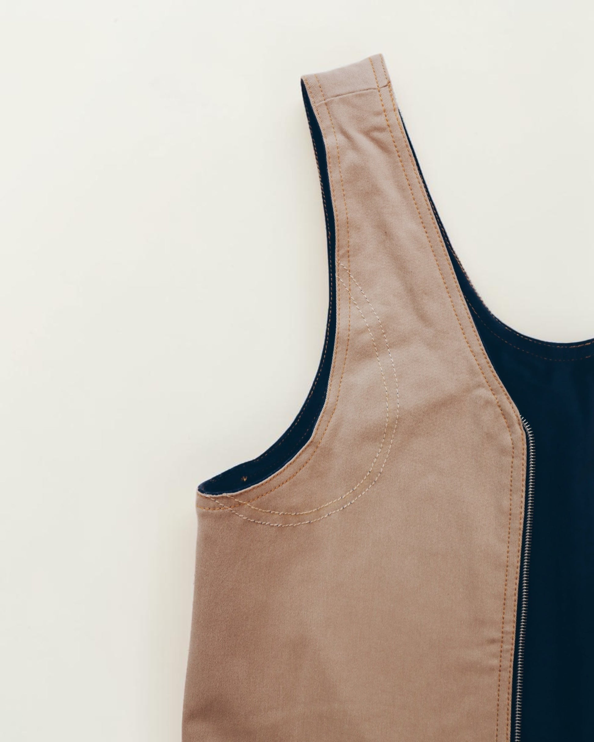 Hue Labs Everyday Essential tote bag in tan and navy blue with durable canvas construction and ergonomic shoulder strap