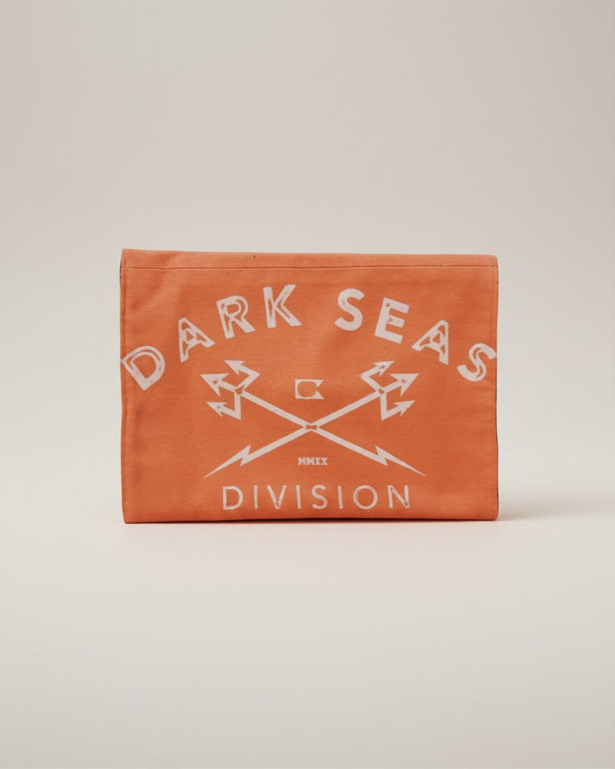 Hue Labs peach envelope clutch made from upcycled textiles featuring white Dark Seas Division graphic print