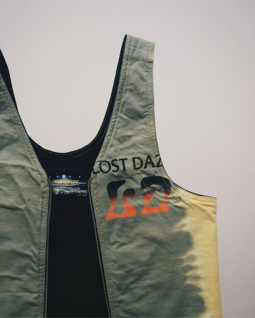 Hue Labs Piña Colada reversible vest bag in olive green and yellow upcycled fabric with a gun metal zipper.