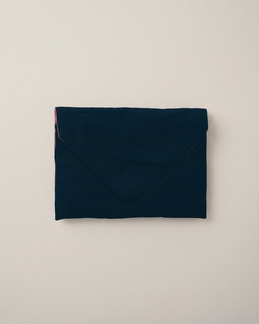 Hue Labs purple slate envelope clutch made from sustainable upcycled textiles with a magnetic snap closure.