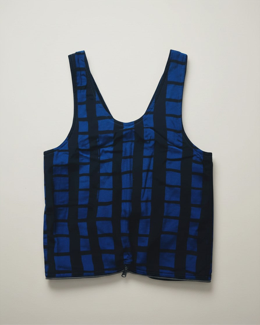 Hue Labs reversible blue grid vest bag made from upcycled materials with a gun metal zipper