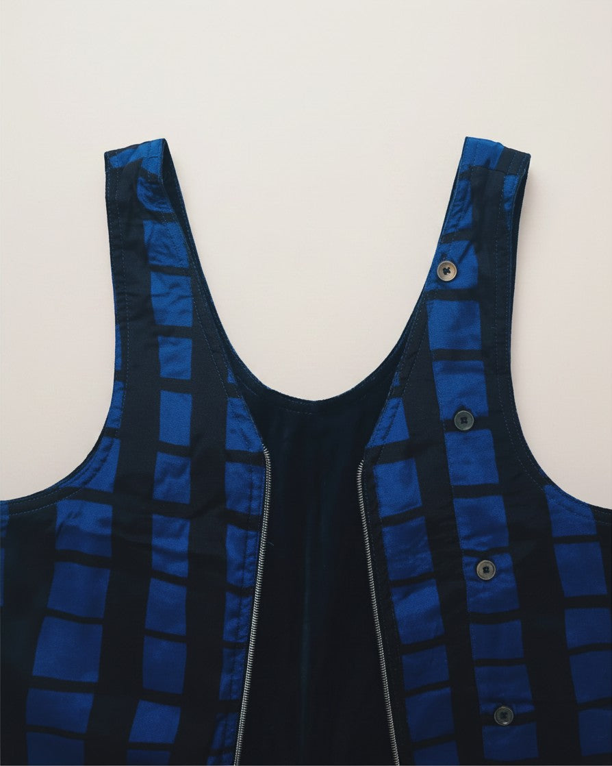 Hue Labs reversible blue grid vest bag made from upcycled materials with a silver metal zipper
