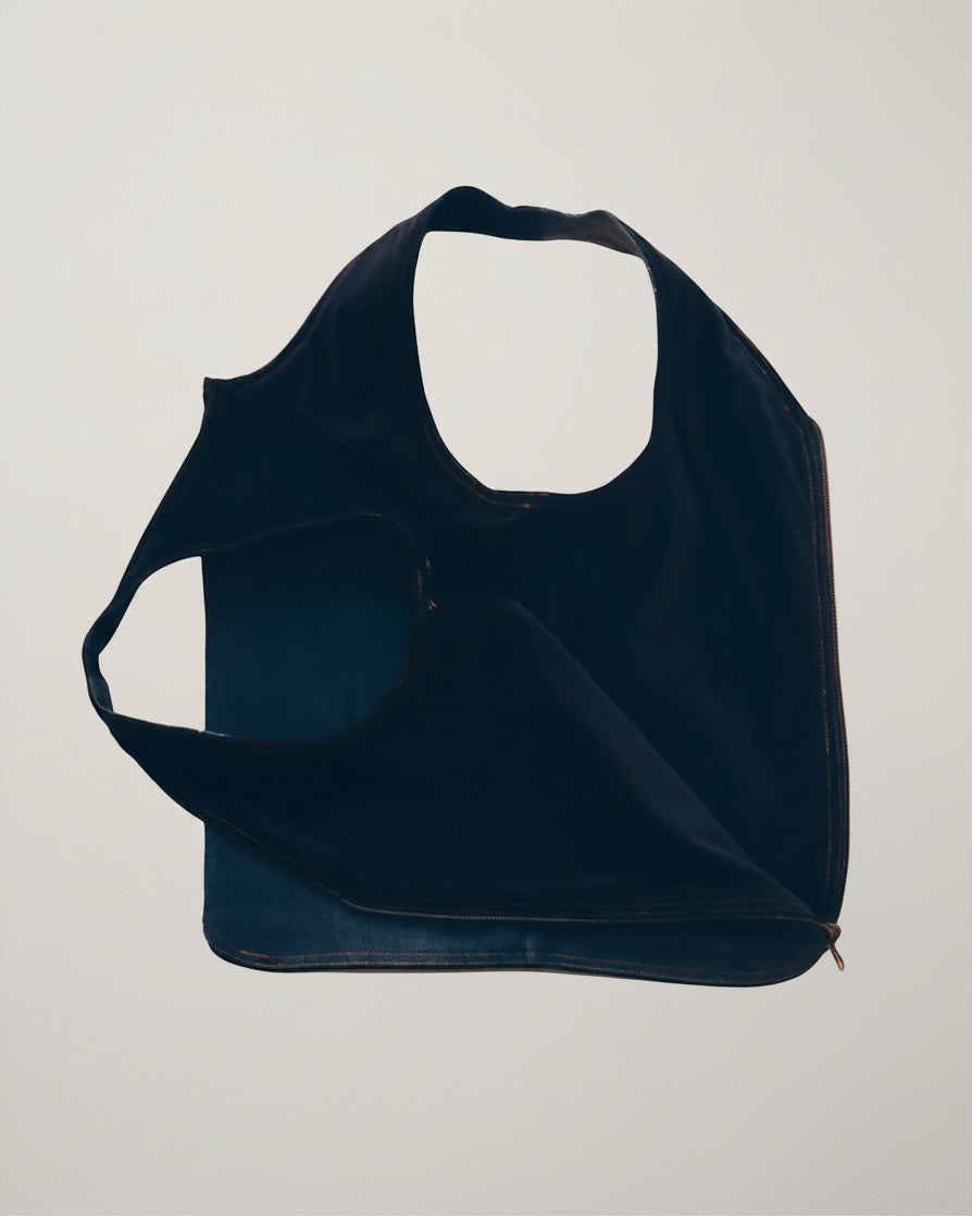 Hue Labs reversible medium wash denim vest bag with gun metal zipper, handcrafted from upcycled materials.
