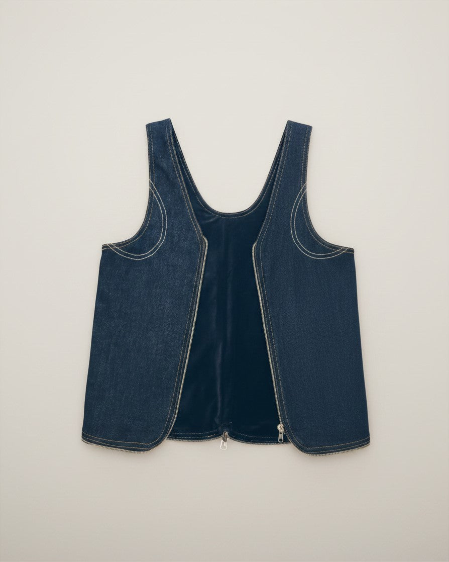Hue Labs reversible blackout denim vest bag with gun metal zipper, handcrafted from upcycled dark blue denim fabric.