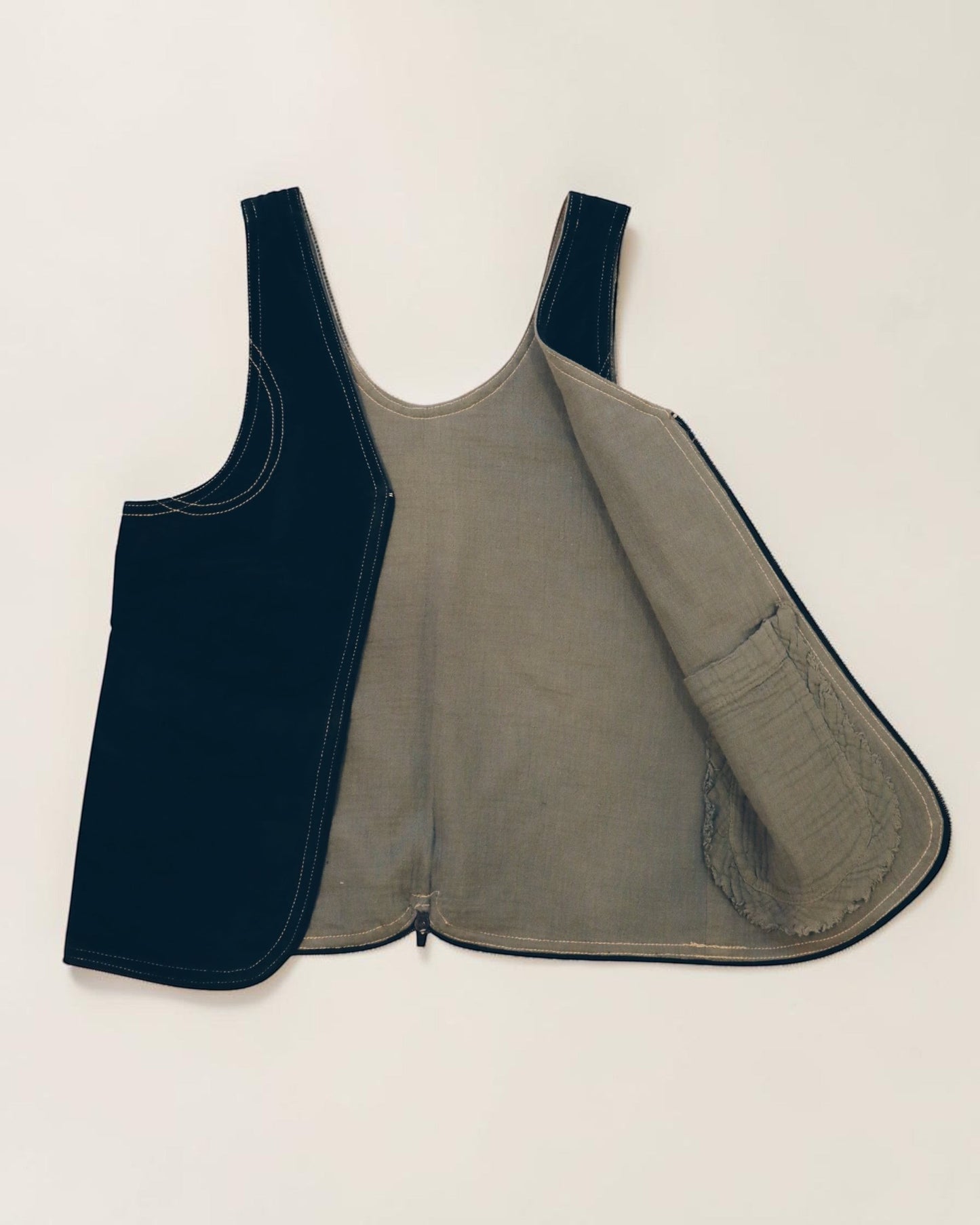Hue Labs reversible Garden Vest Bag in black and grey upcycled fabric with a gun metal double direction zipper.