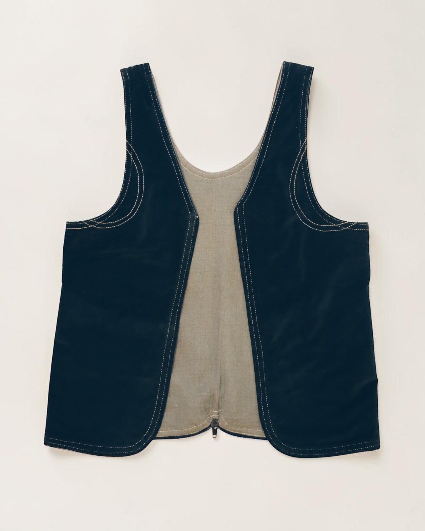 Hue Labs reversible Garden Vest Bag in black and beige upcycled fabric with a gun metal zipper.