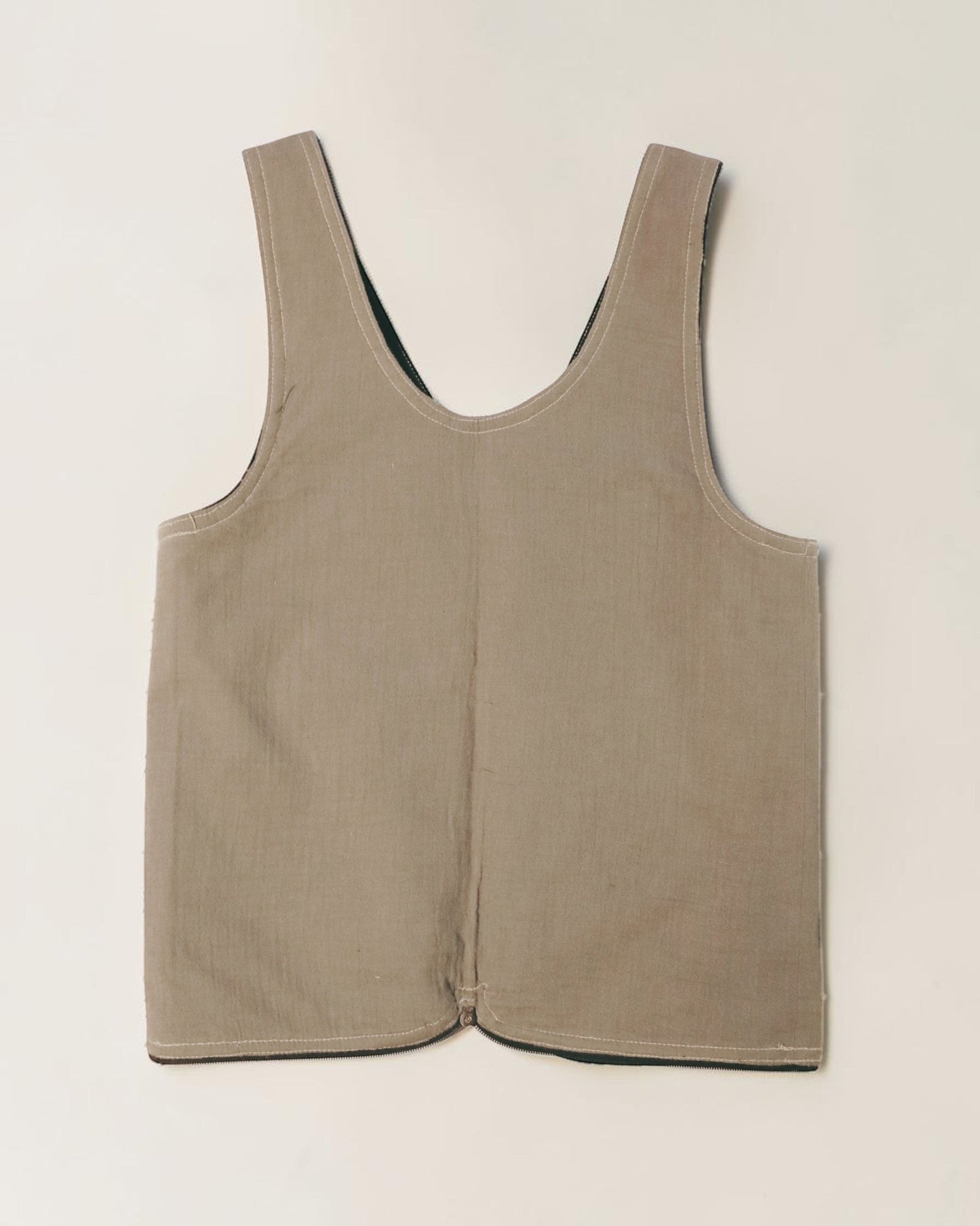 Hue Labs reversible Garden Vest Bag in beige upcycled fabric with a gun metal zipper, versatile wearable accessory.
