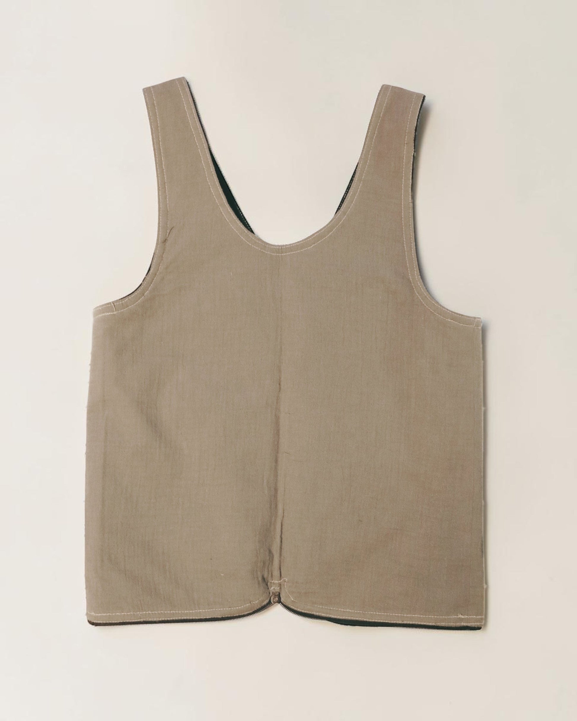 Hue Labs reversible Garden Vest Bag in beige upcycled fabric with a gun metal zipper, versatile wearable accessory.