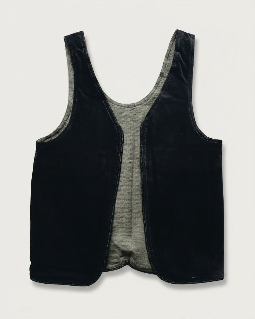 Hue Labs reversible olive and black upcycled vest bag with a gun metal zipper, handcrafted for versatile wear.