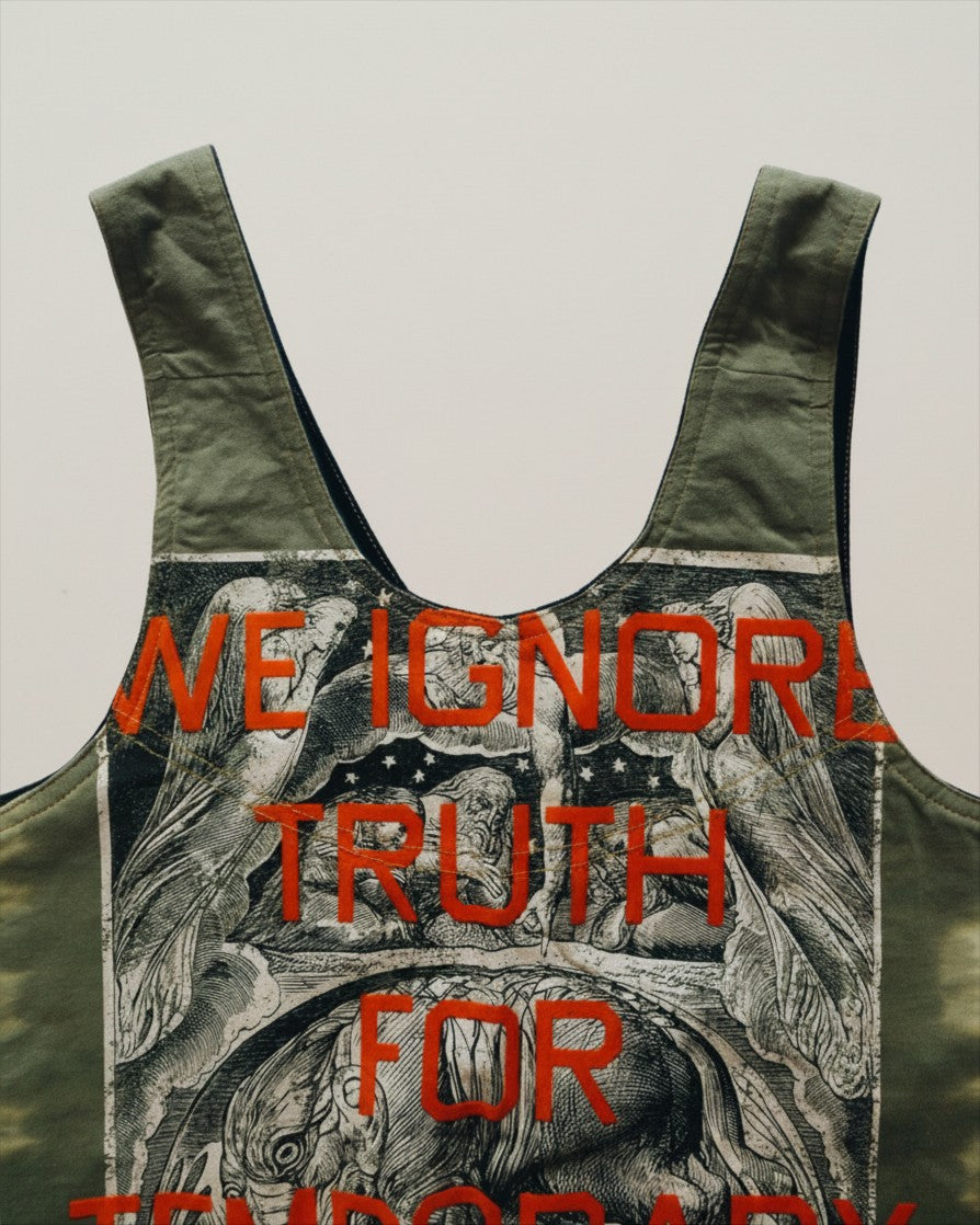 Hue Labs Piña Colada reversible vest bag in olive green with graphic print and red text lettering
