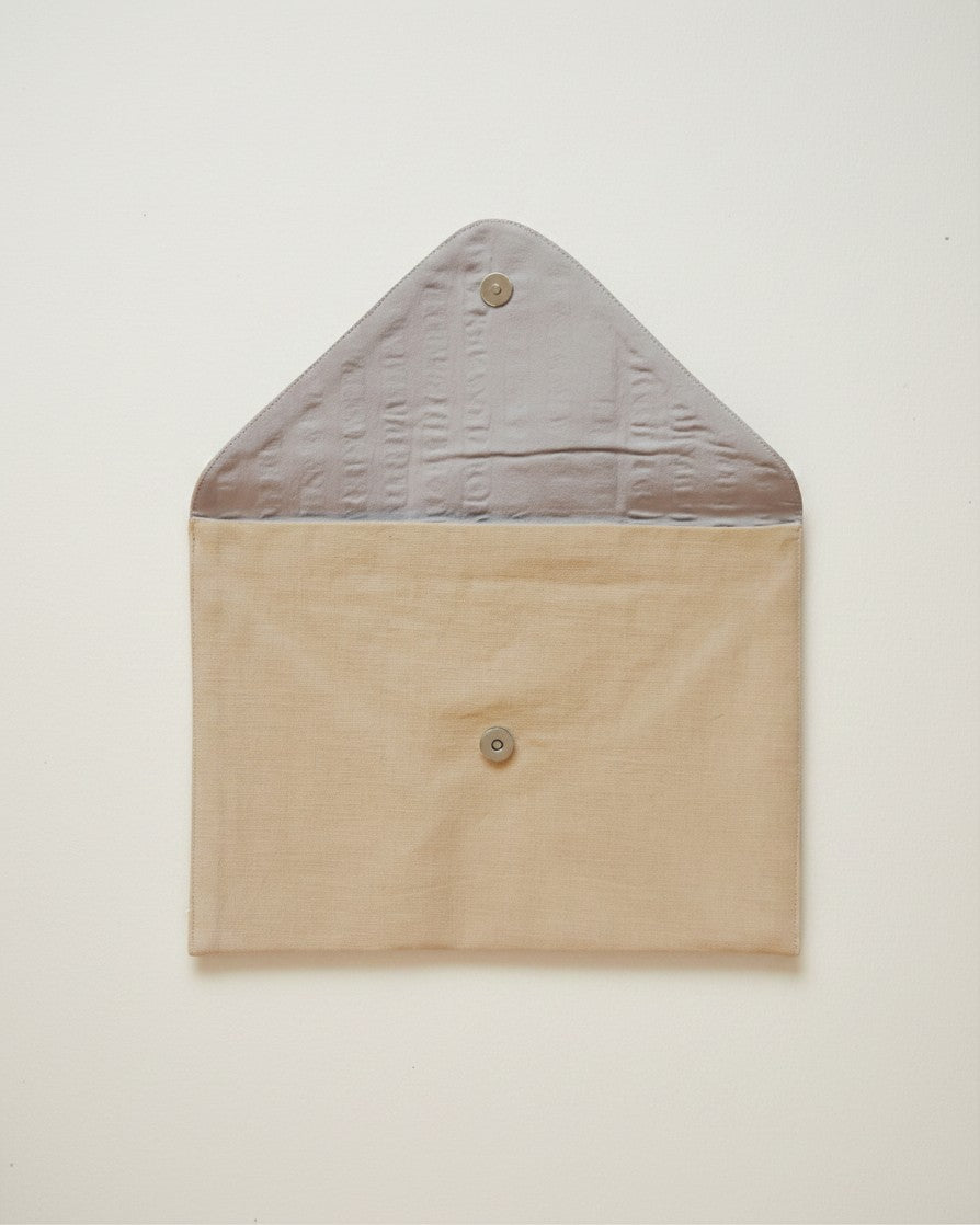 Hue Labs Sage Kiss envelope clutch bag in beige and grey upcycled textile with a magnetic snap closure