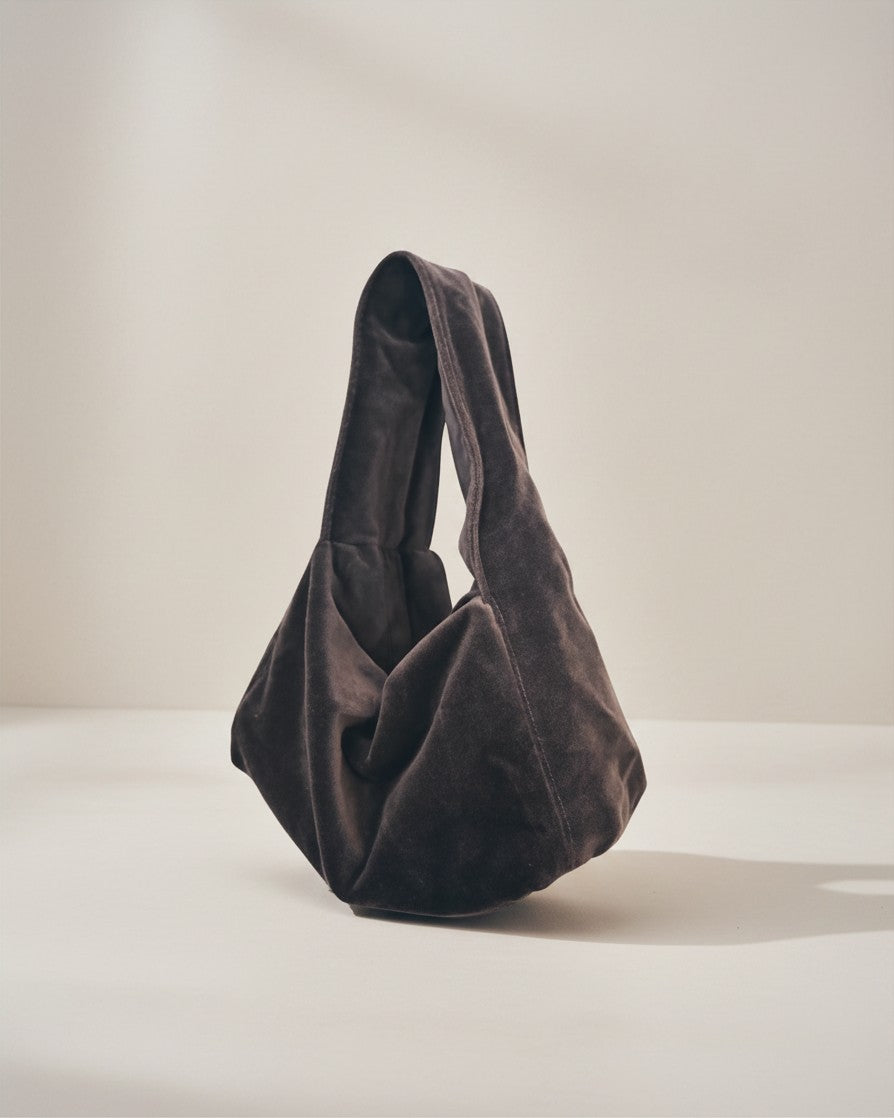 Hue Labs Silver Bullet dumpling shoulder bag in dark grey upcycled fabric with a soft, structured slouchy design.