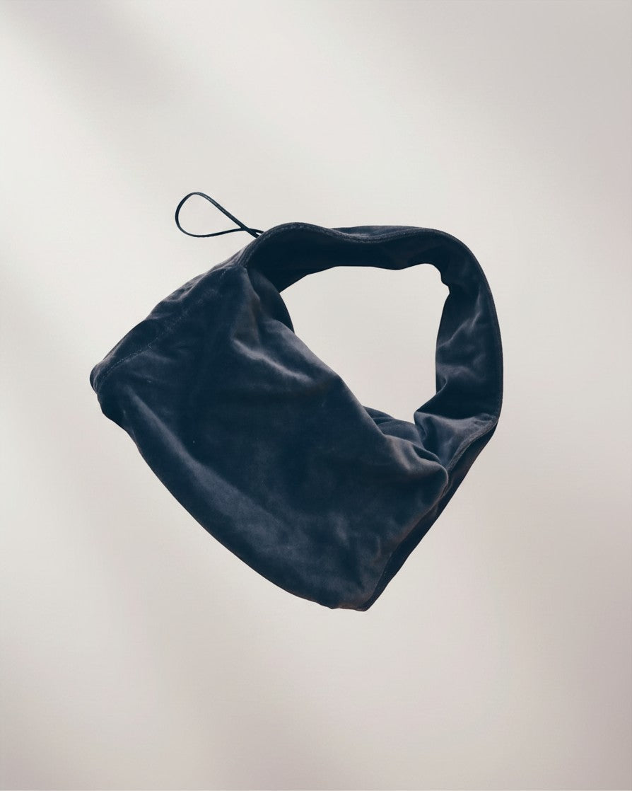 Hue Labs Silver Bullet dumpling shoulder bag in dark grey velvet with a soft, compact, and structured design.
