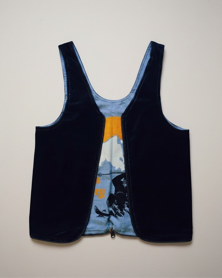 Hue Labs Sun Valley reversible vest bag featuring dark navy velvet on one side and a graphic print on the other.