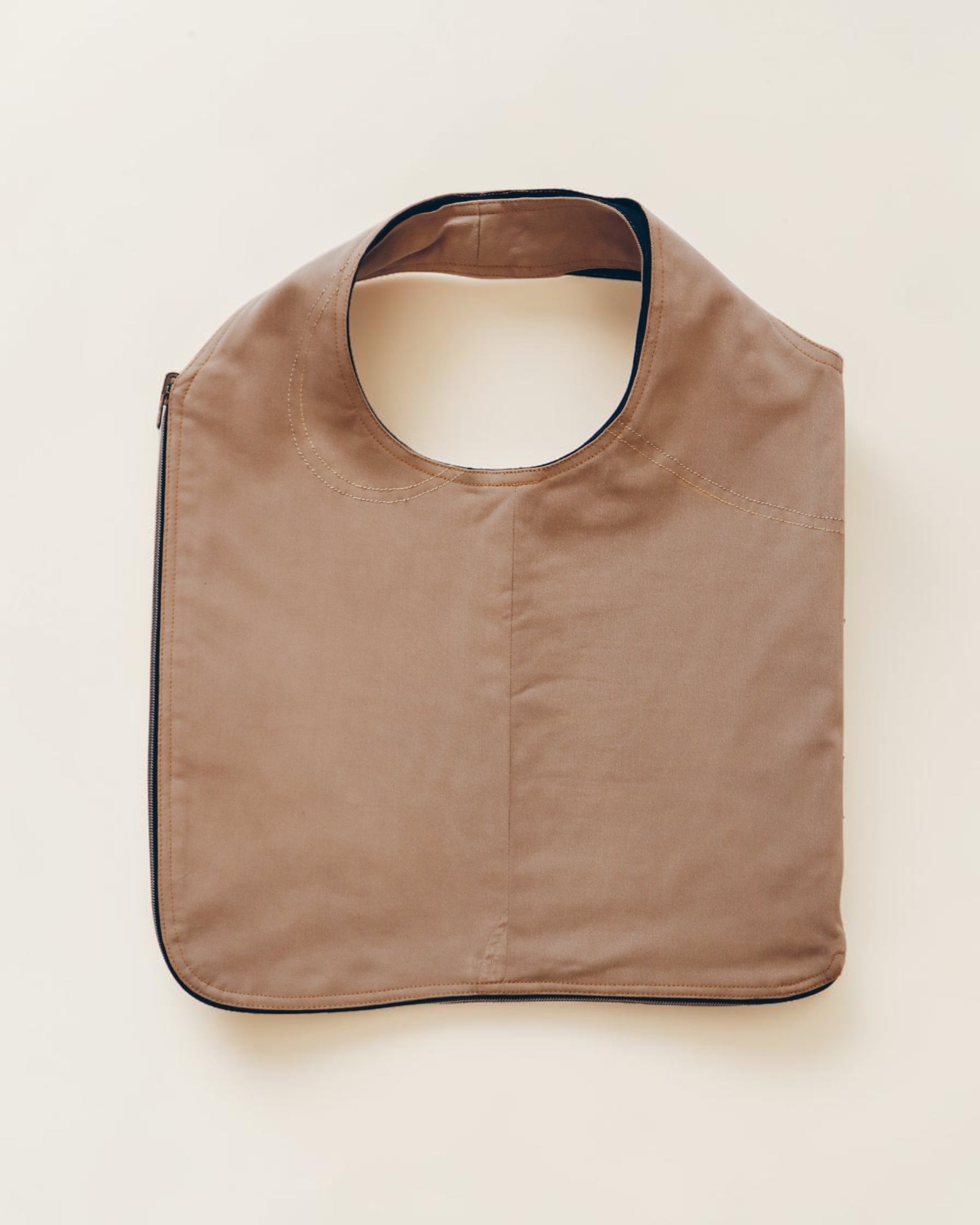Hue Labs tan minimalist tote bag with ergonomic shoulder strap and durable construction for daily use.