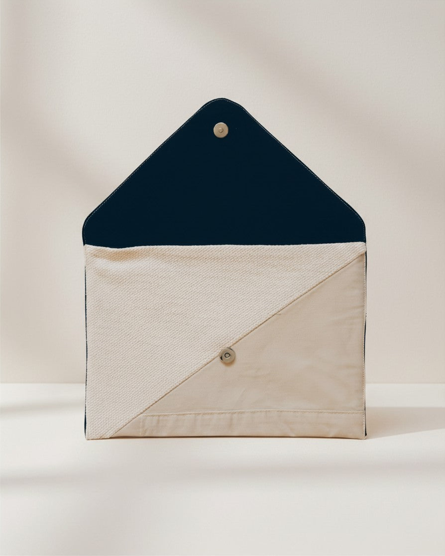 Hue Labs Earth Tones II envelope clutch made from upcycled beige and navy textiles with a magnetic snap closure.